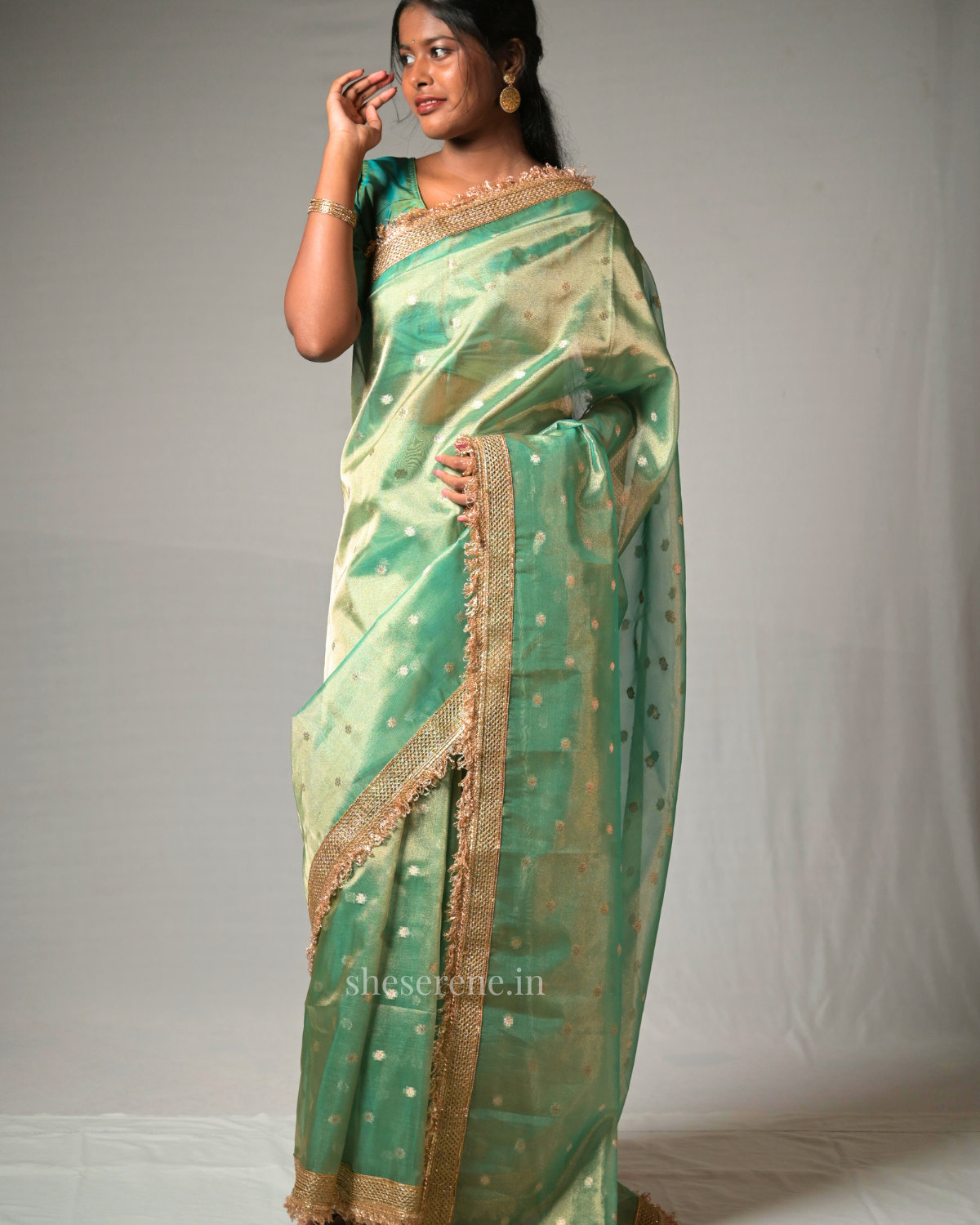Gulnaaz Green Tissue Silk Saree