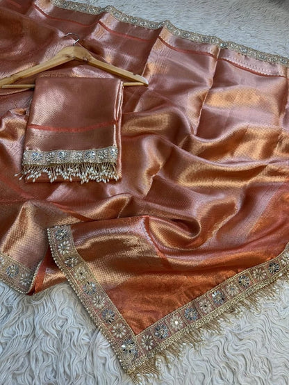 Naira Orange Tissue Silk Saree