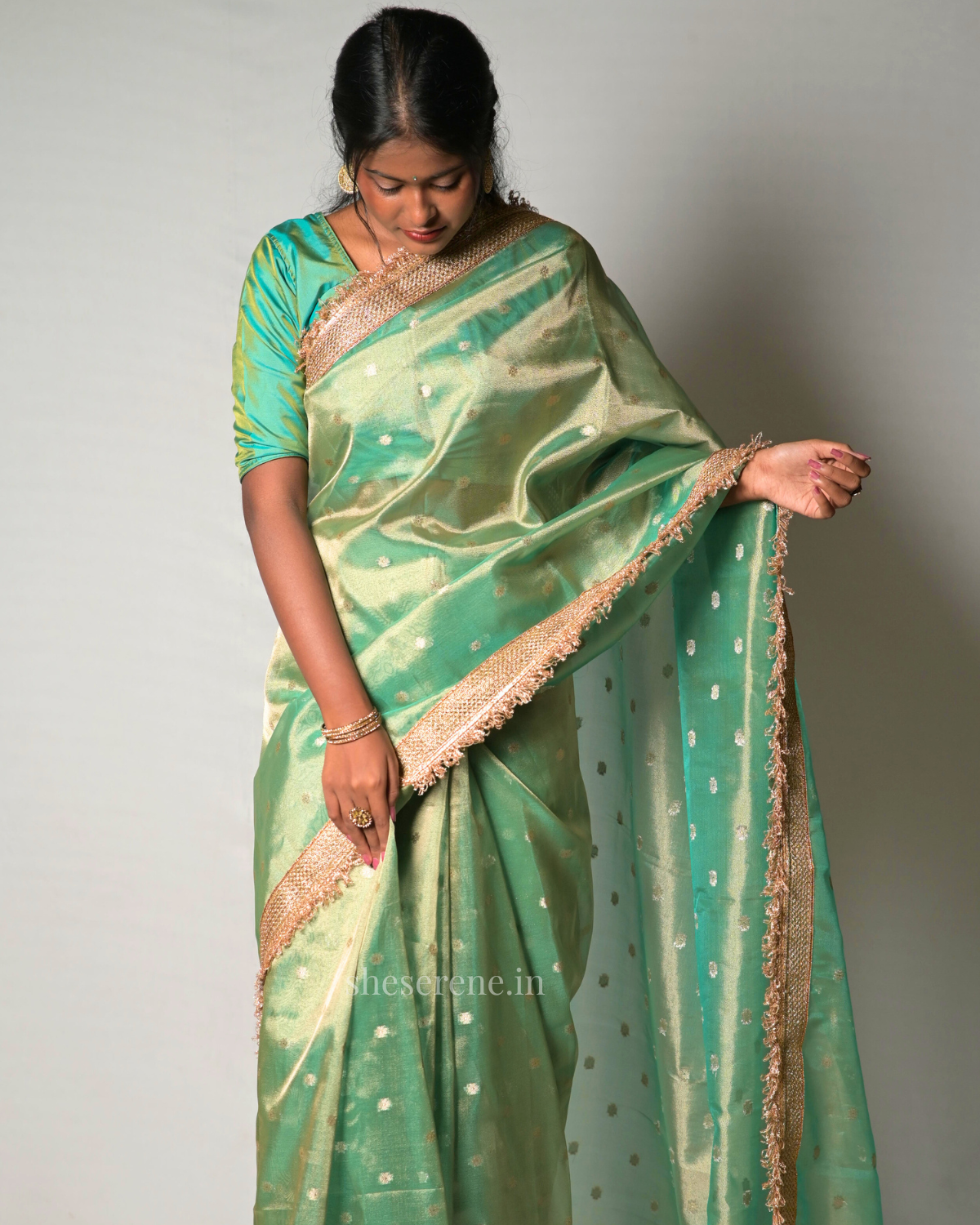Gulnaaz Green Tissue Silk Saree