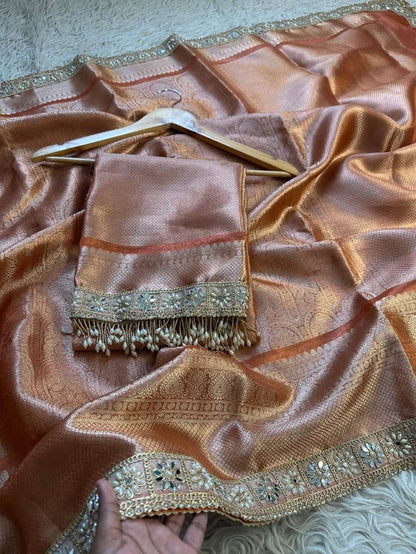 Naira Orange Tissue Silk Saree